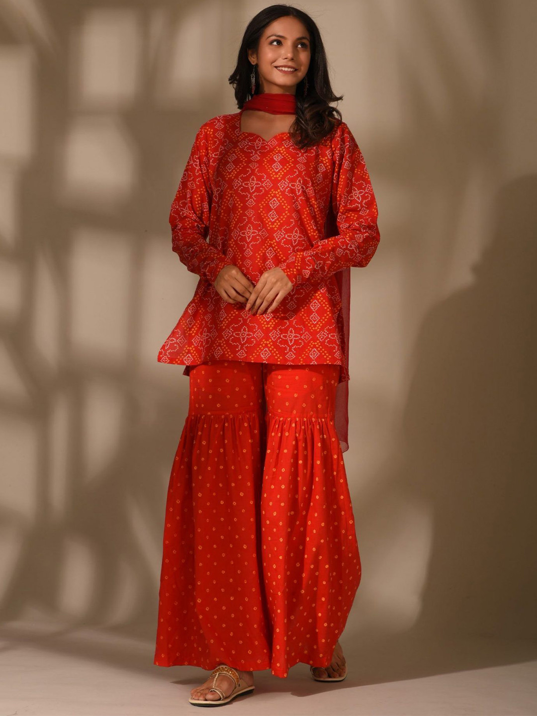 

DIMPLE DESIGN STUDIO Bandhani Printed Pure Cotton Straight Kurta With Sharara & Dupatta, Red