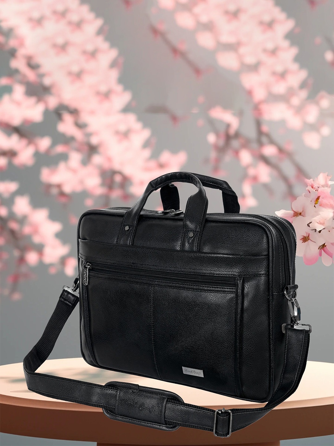 

HARD CRAFT Men Textured PU Laptop Bag, Black