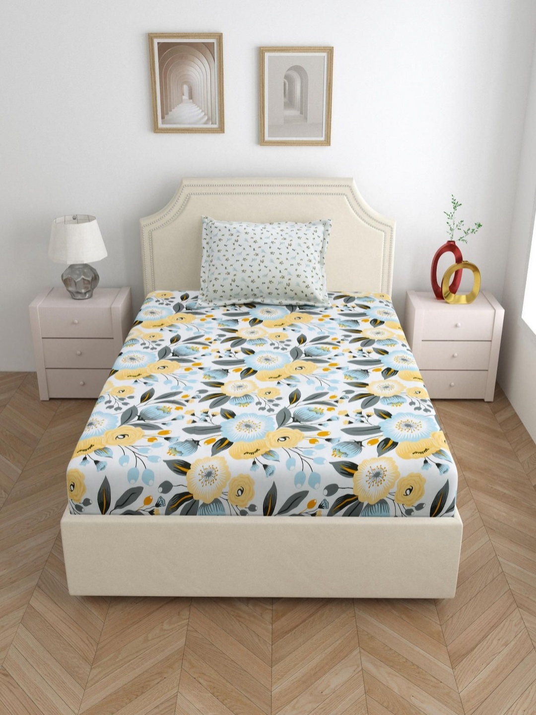 

Aura White & Blue Floral 144 TC Single Bedsheet with 1 Pillow Covers