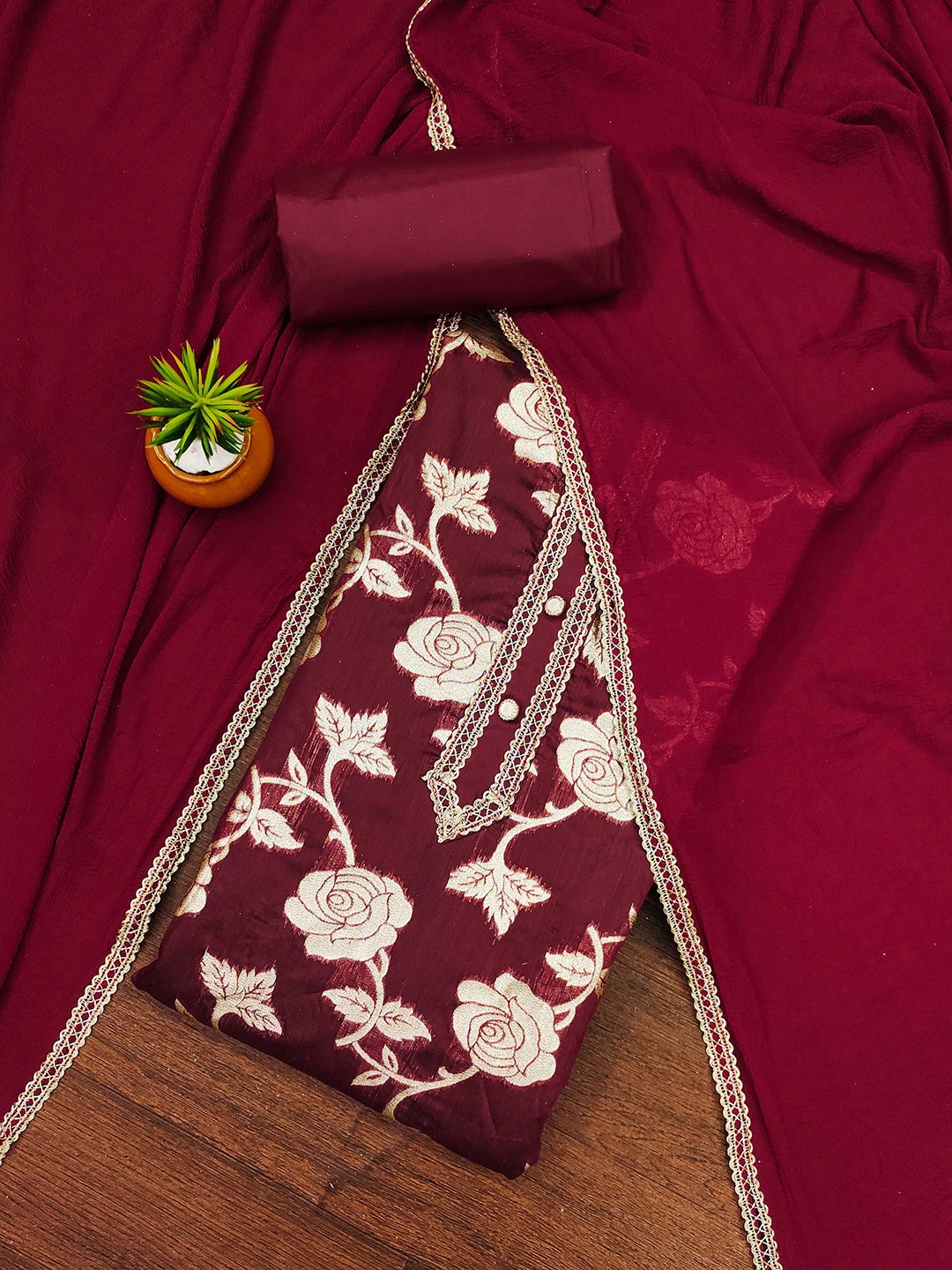 

Maroosh Floral Woven design Banarasi Jacquard Unstitched Dress Material, Maroon