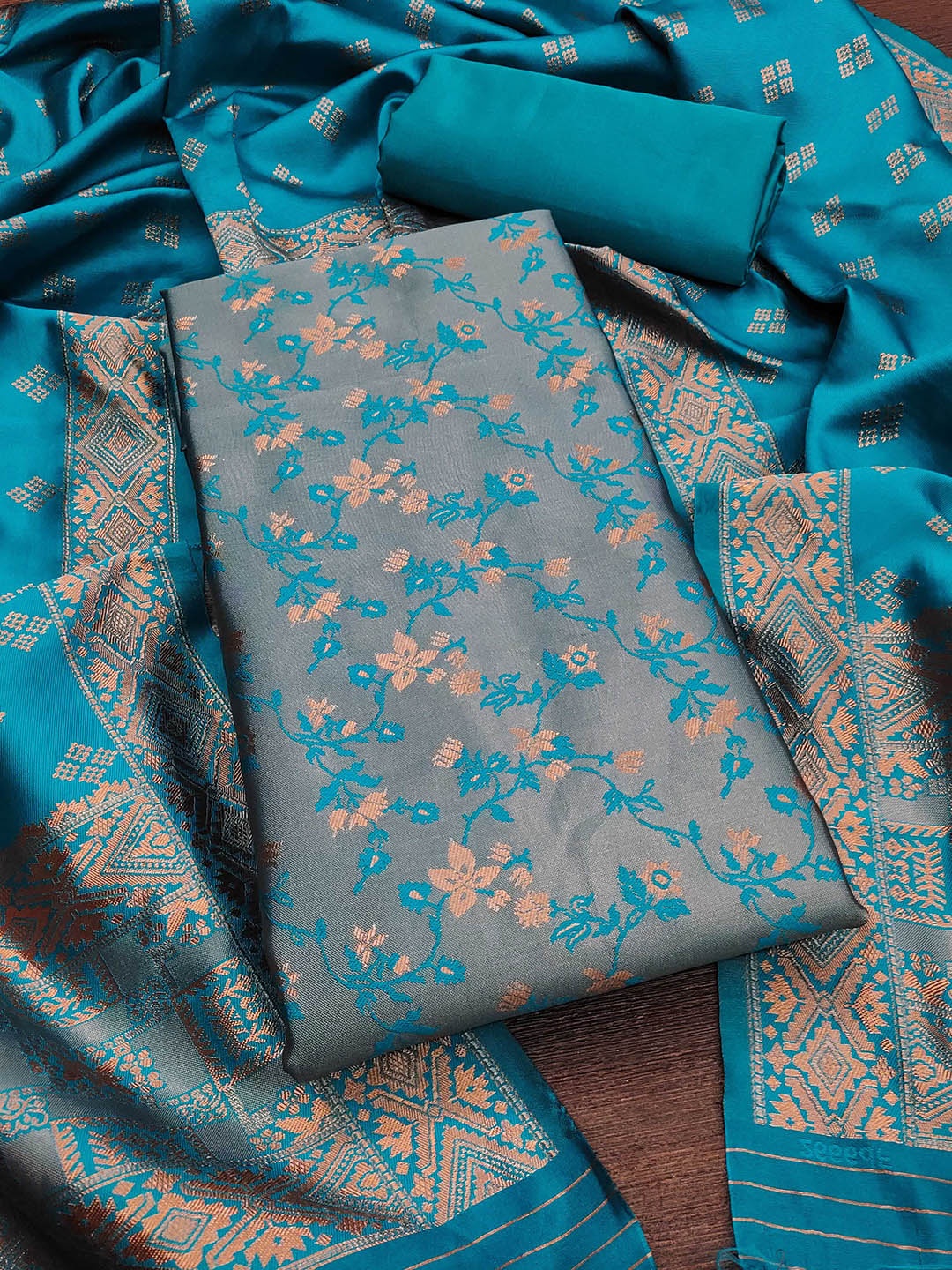 

Maroosh Floral Printed Jacquard Woven Design Unstitched Dress Material, Turquoise blue
