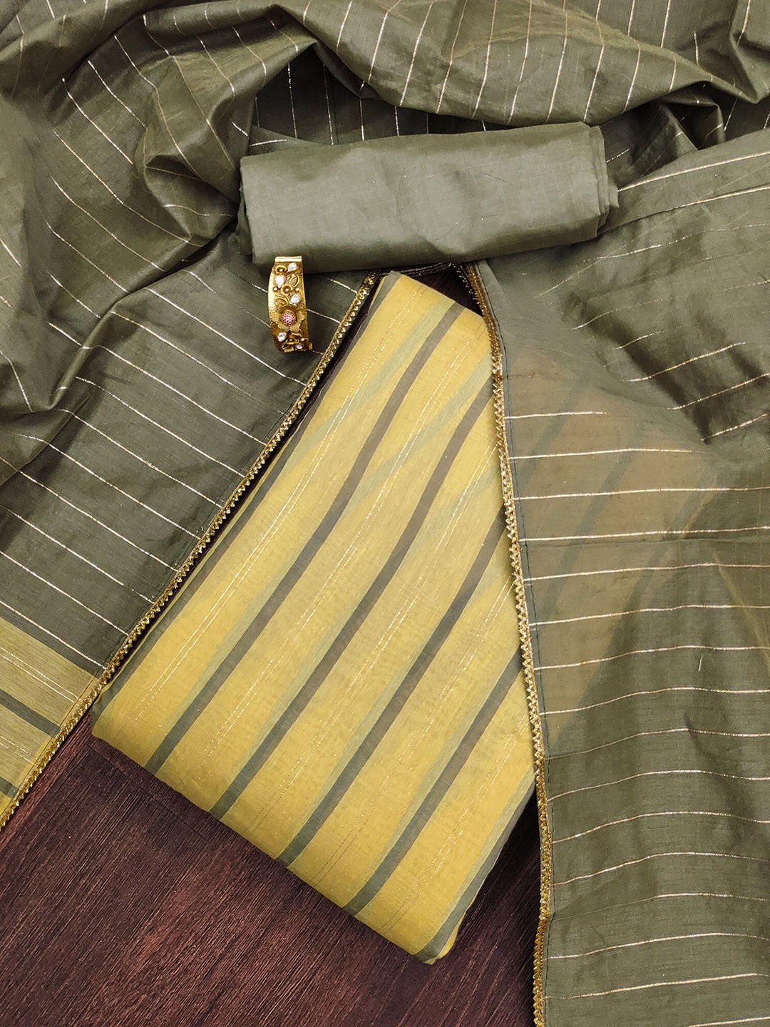 

Maroosh Striped Printed Woven Banarasi Silk Unstitched Dress Material, Yellow