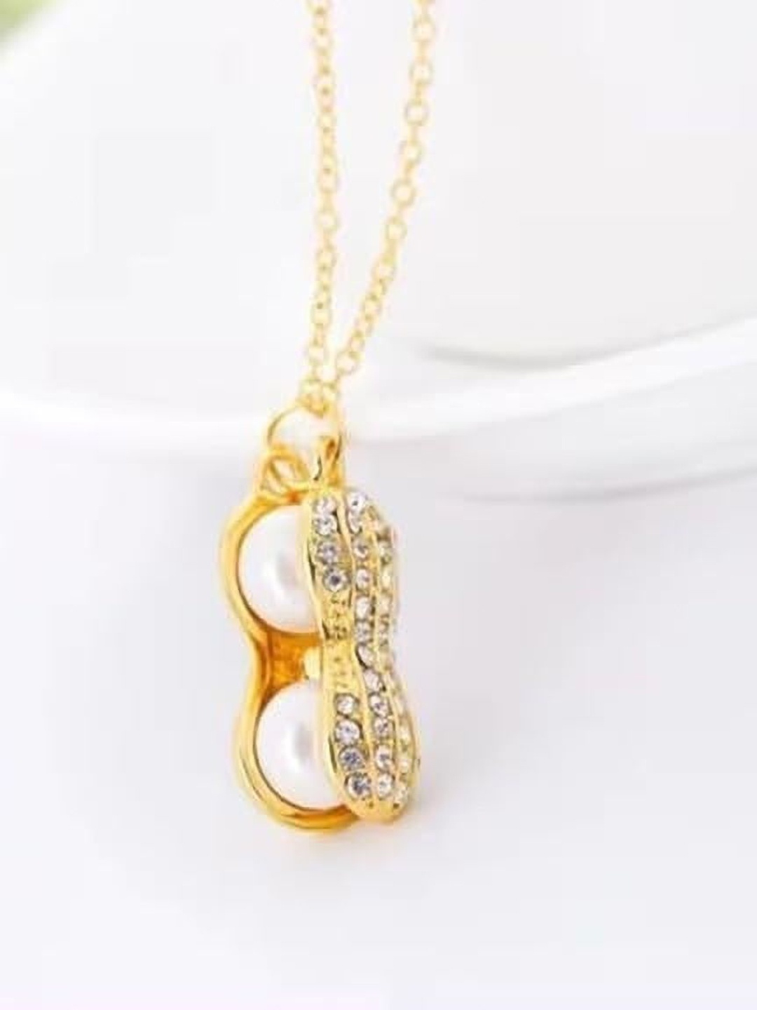 

Lila Gold-Plated Stainless Steel Peanut Shape CZ Pendants With Chain