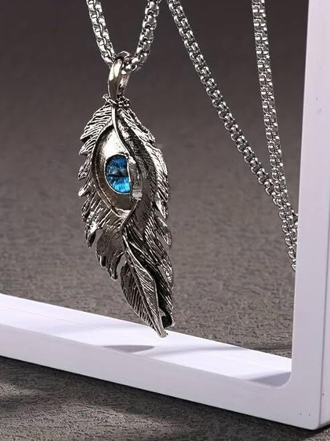 

Lila Stainless Steel Devil Eyes Feather Shaped Pendant with Chain, Silver