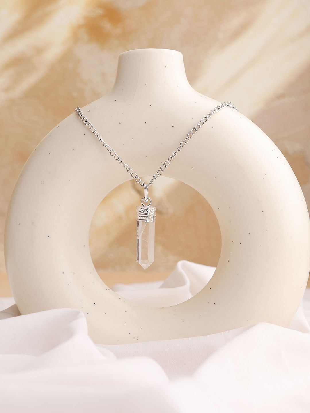 

Shubhanjali Silver-Plated Clear Quartz Pencil Pendant