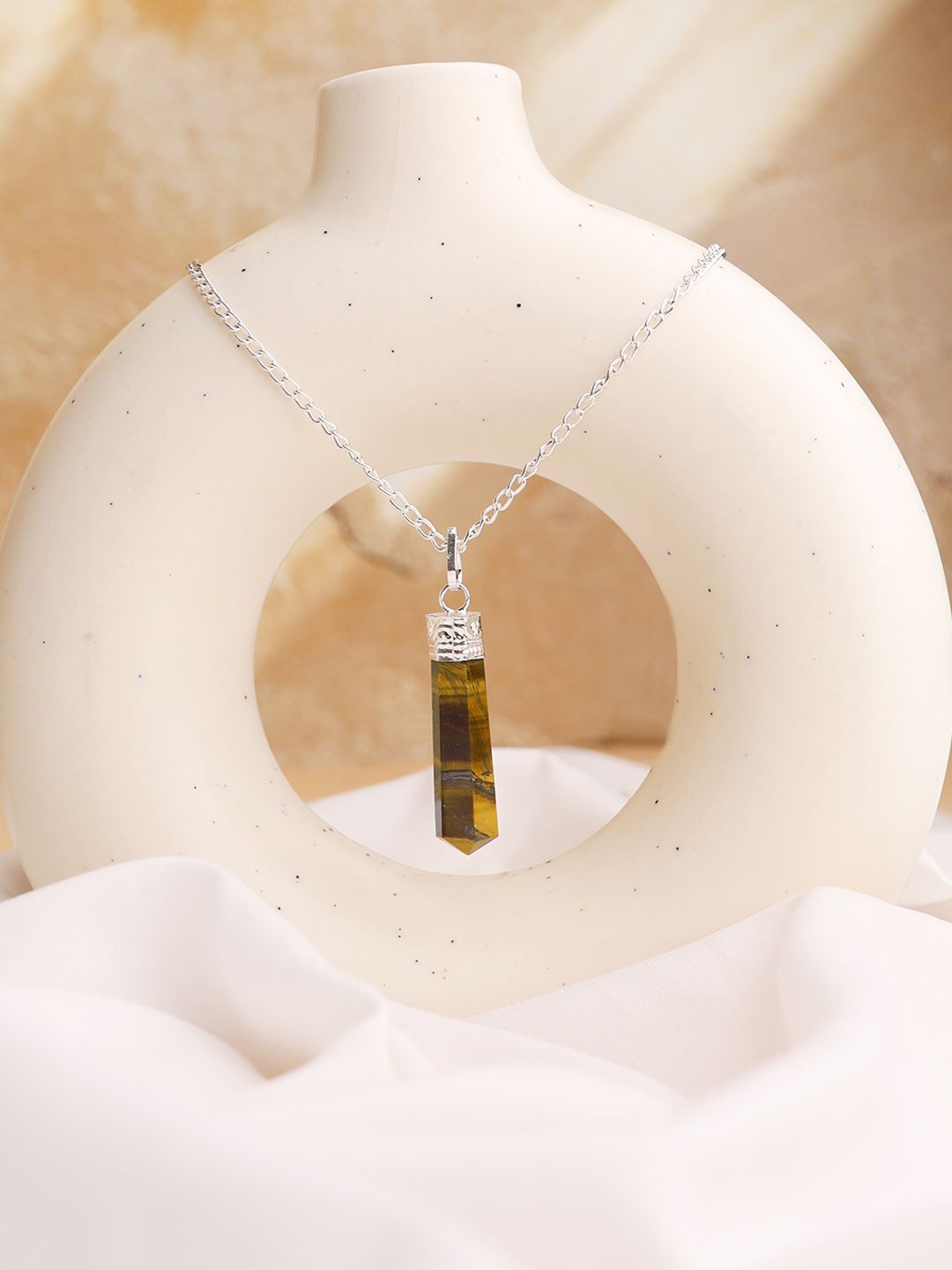 

Shubhanjali Unisex Silver-Plated Tiger Eye Stone Studded Pencil Pendant