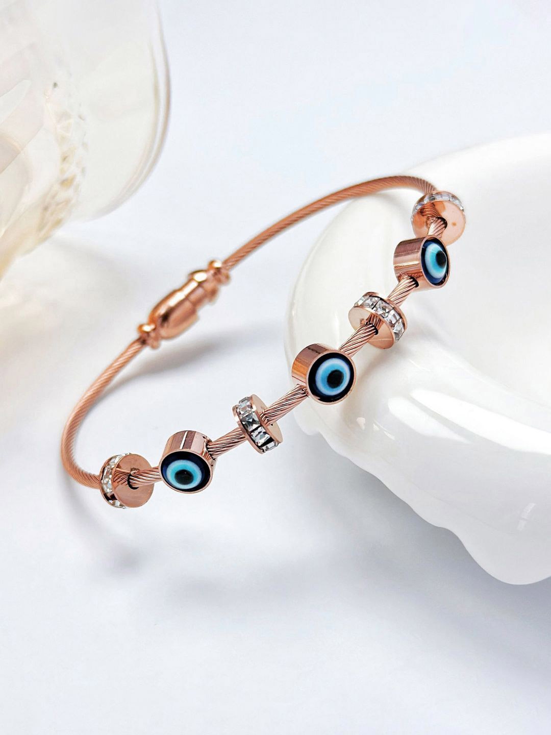 

Designs & You Rose Gold-Plated American Diamond Studded Evil Eye Bangle-Style Bracelet