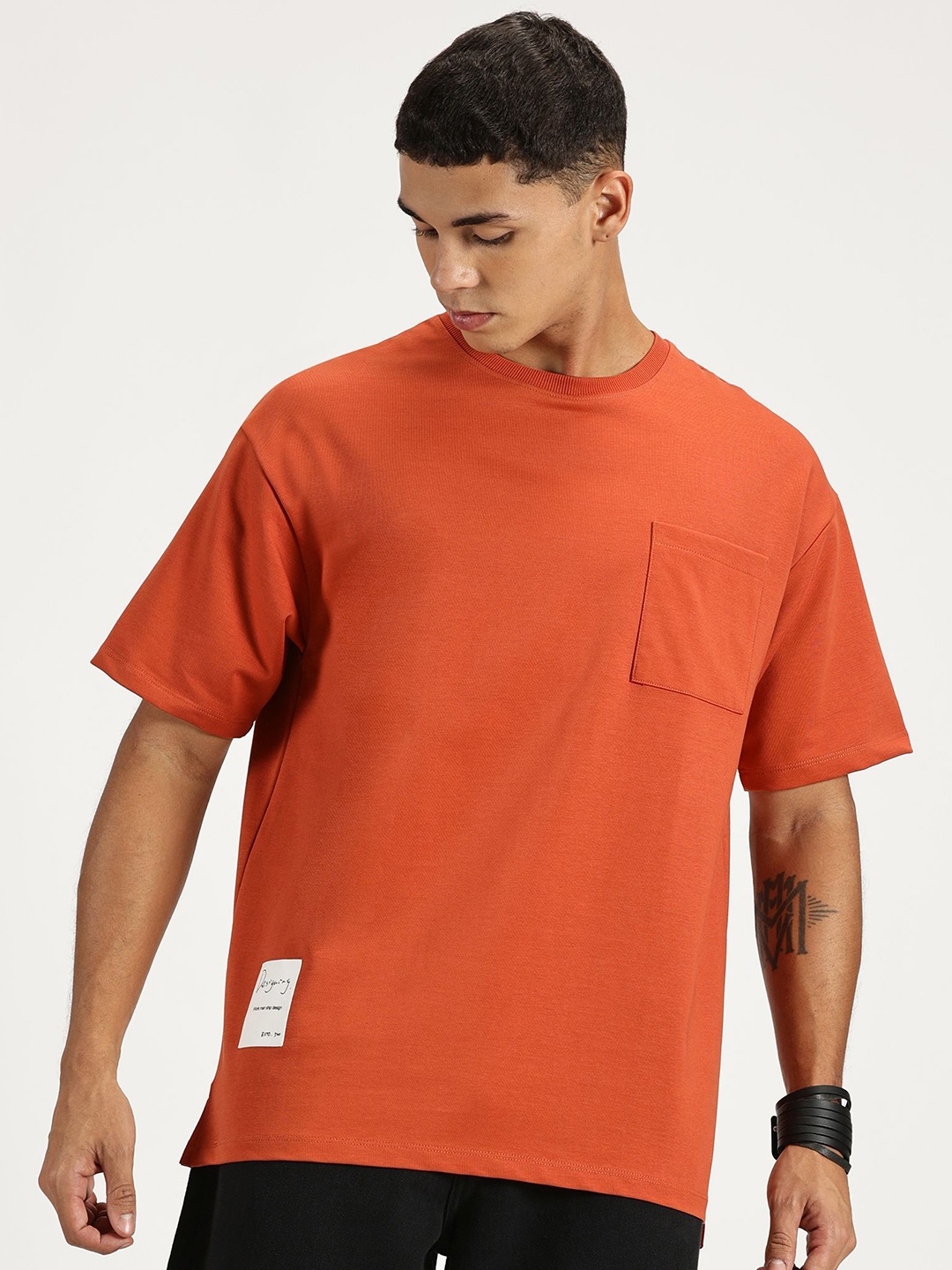 

RAVINIK Men Graphic Printed Round Neck Cotton Oversized T-shirt, Orange