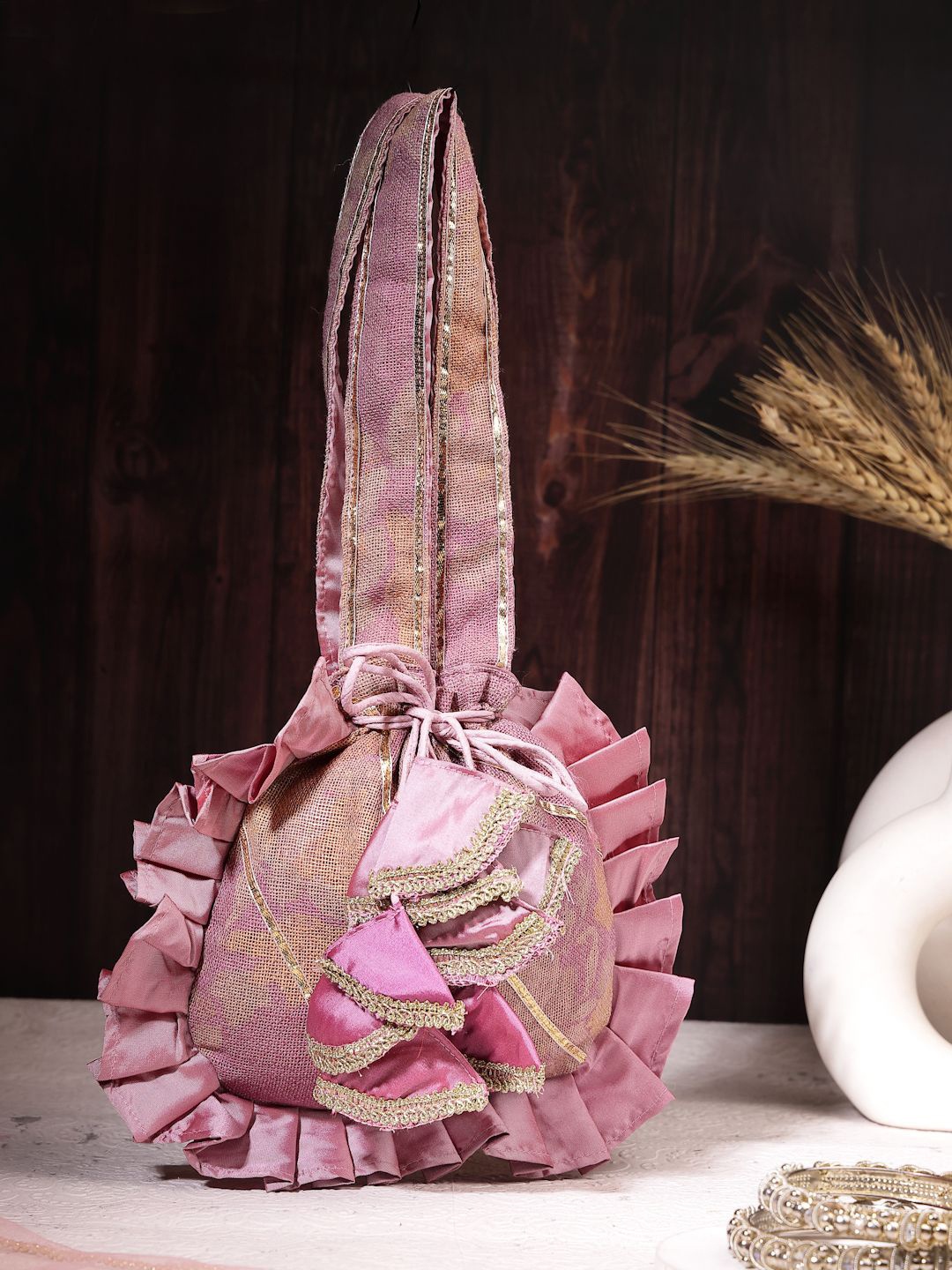 

Dhrohar Embroidered Tasselled Potli Clutch, Pink