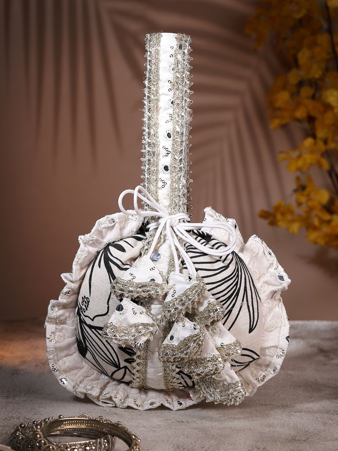 

Dhrohar Embroidered Tasselled Potli Clutch, Off white