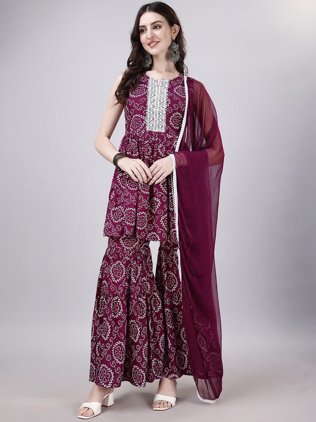 

KALINI Bandhani Printed Gotta Patti Sleeveless A-Line Kurti With Sharara & Dupatta, Purple