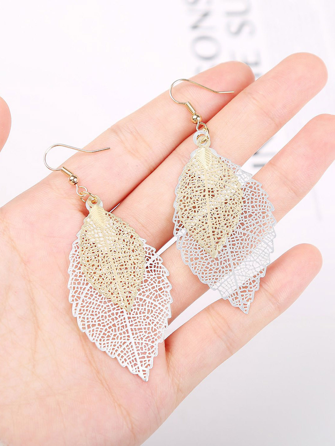 

StyleCast x Revolte Gold-Plated Leaf Shaped Drop Earrings