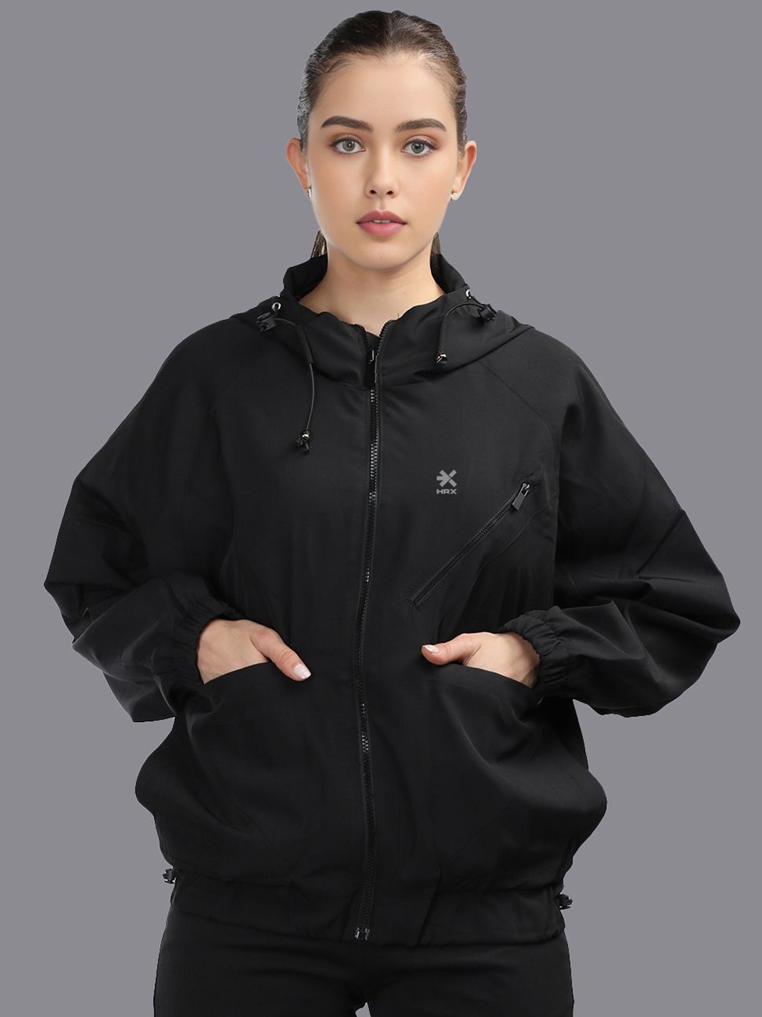 

HRX by Hrithik Roshan Women Hooded Solid Sporty Windcheater Jacket, Black