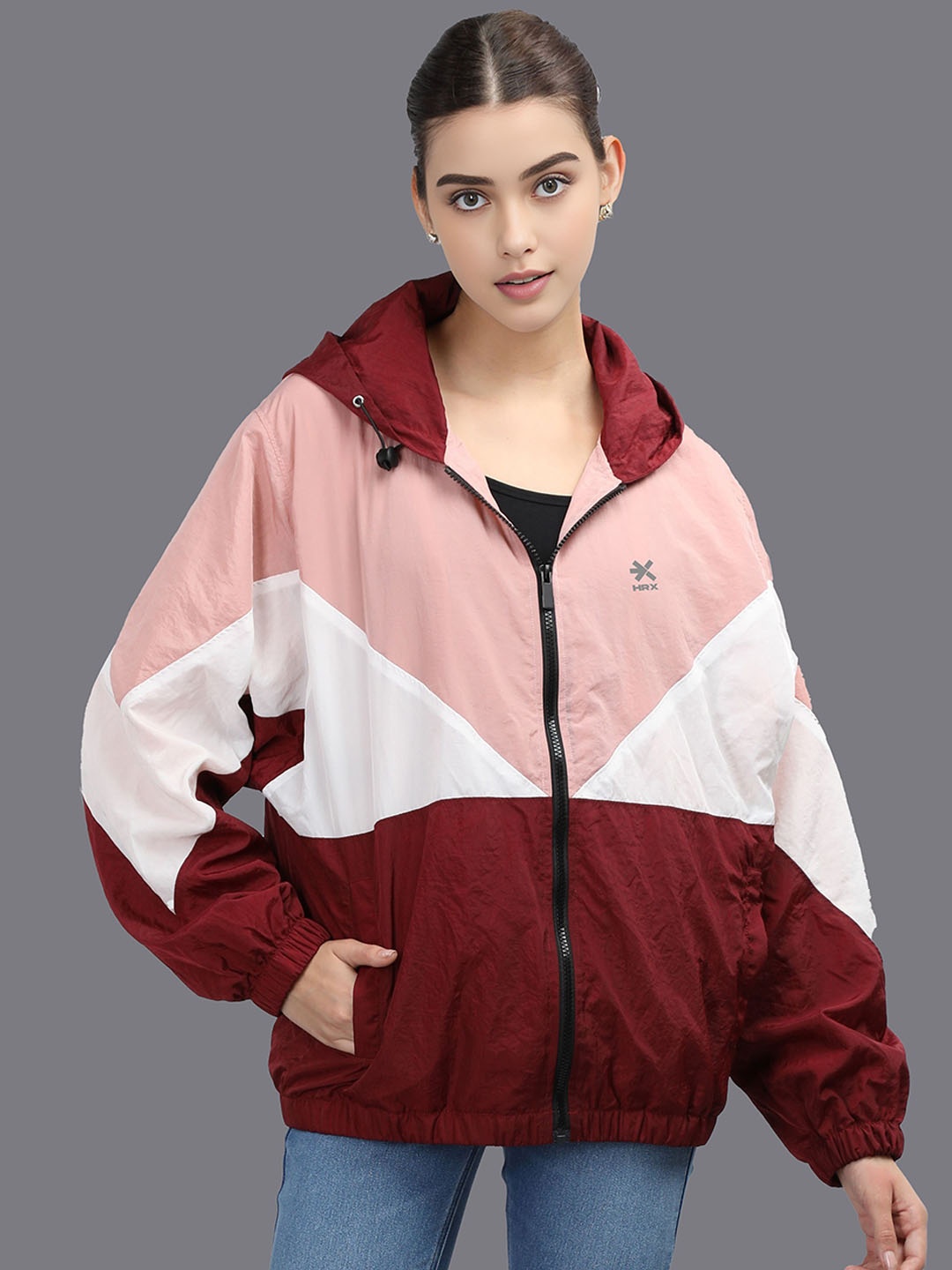 

HRX by Hrithik Roshan Women Hooded Colourblocked Sporty Windcheater Jacket, Maroon
