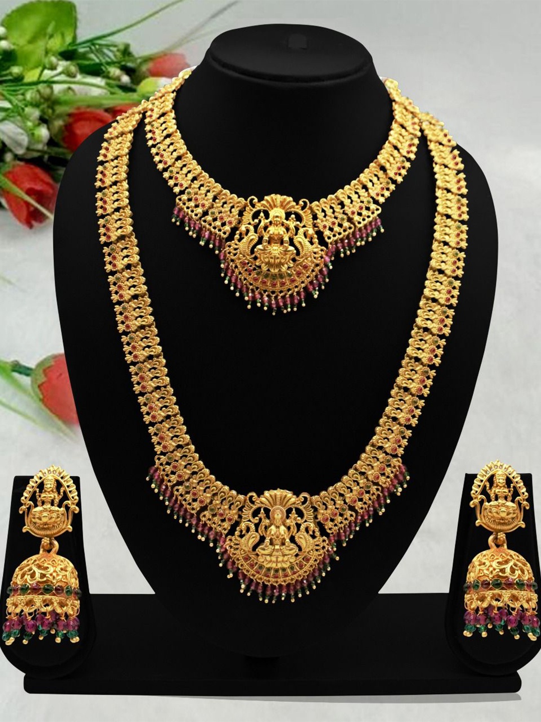 

JANAVI Gold Plated Stones Studded & Beaded Jewellery Set