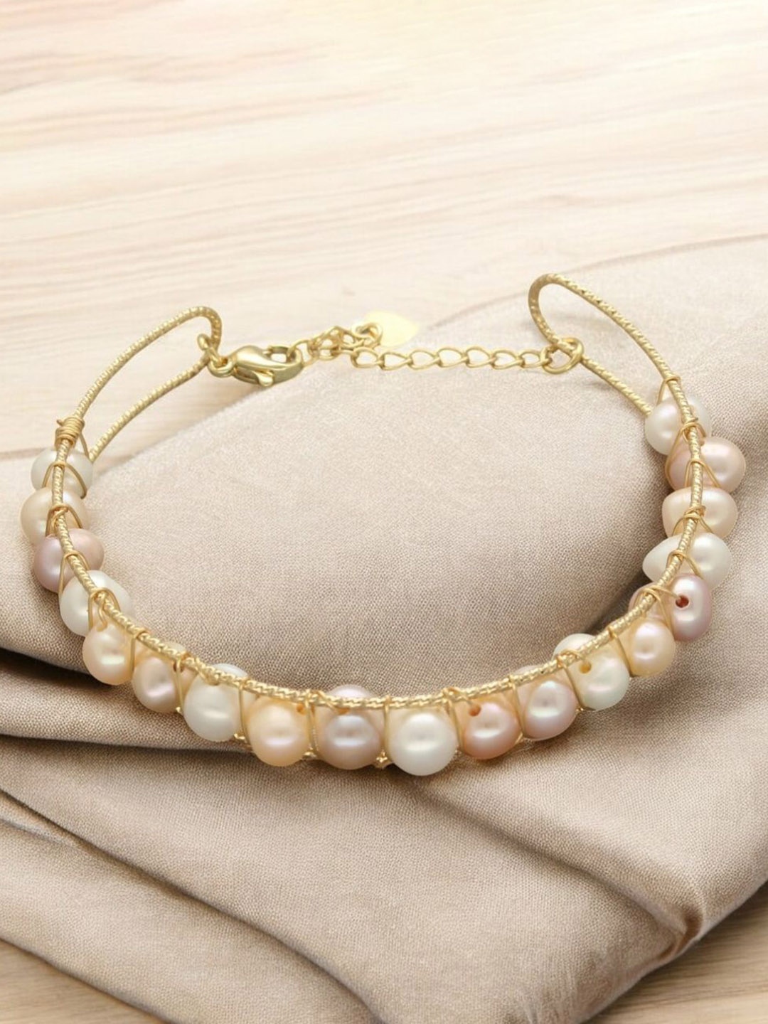 

Sri Jagdamba Pearls Dealer Gold Plated Pearls Bracelet