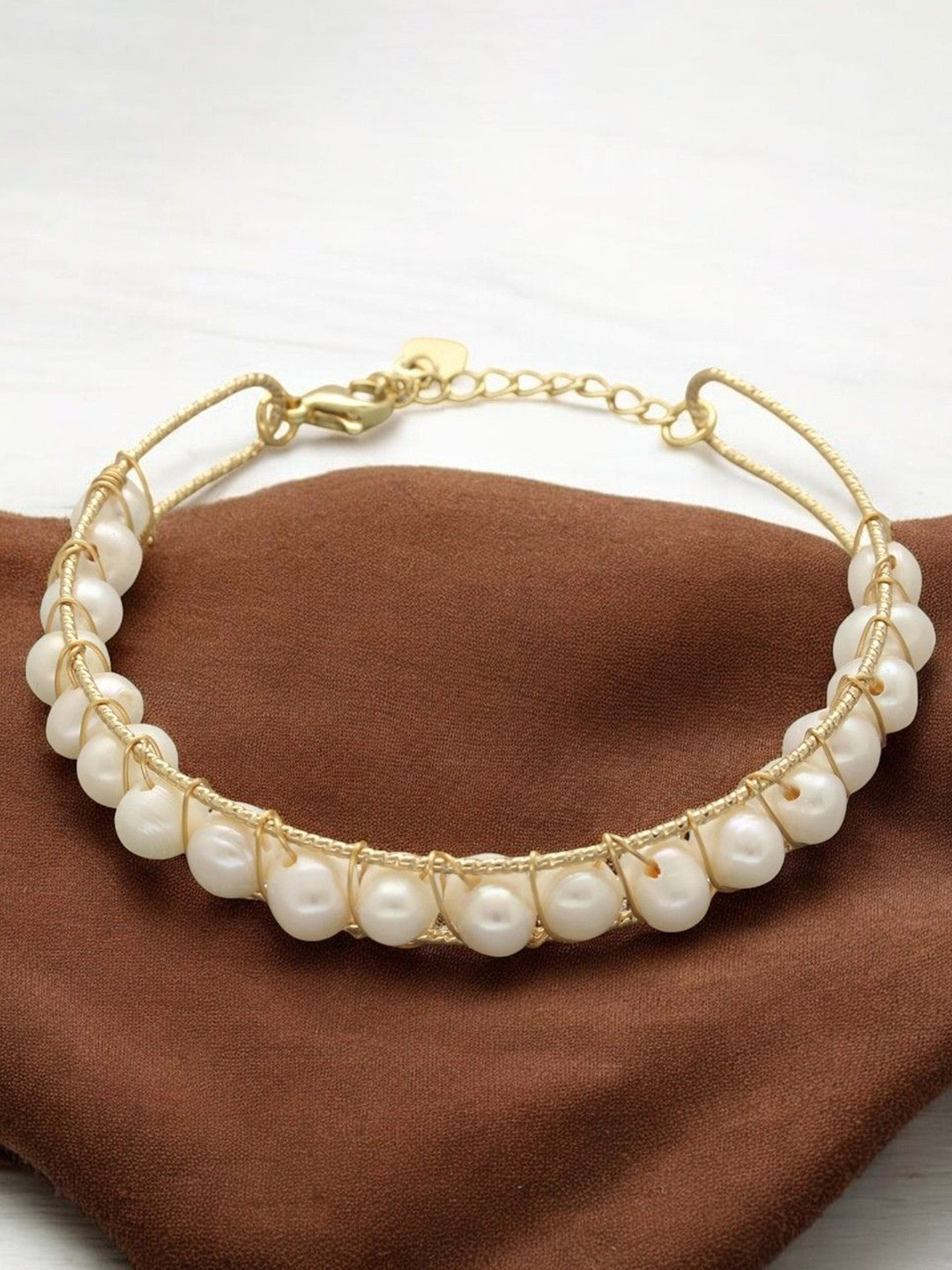 

Sri Jagdamba Pearls Dealer Gold Plated Pearls Bracelet
