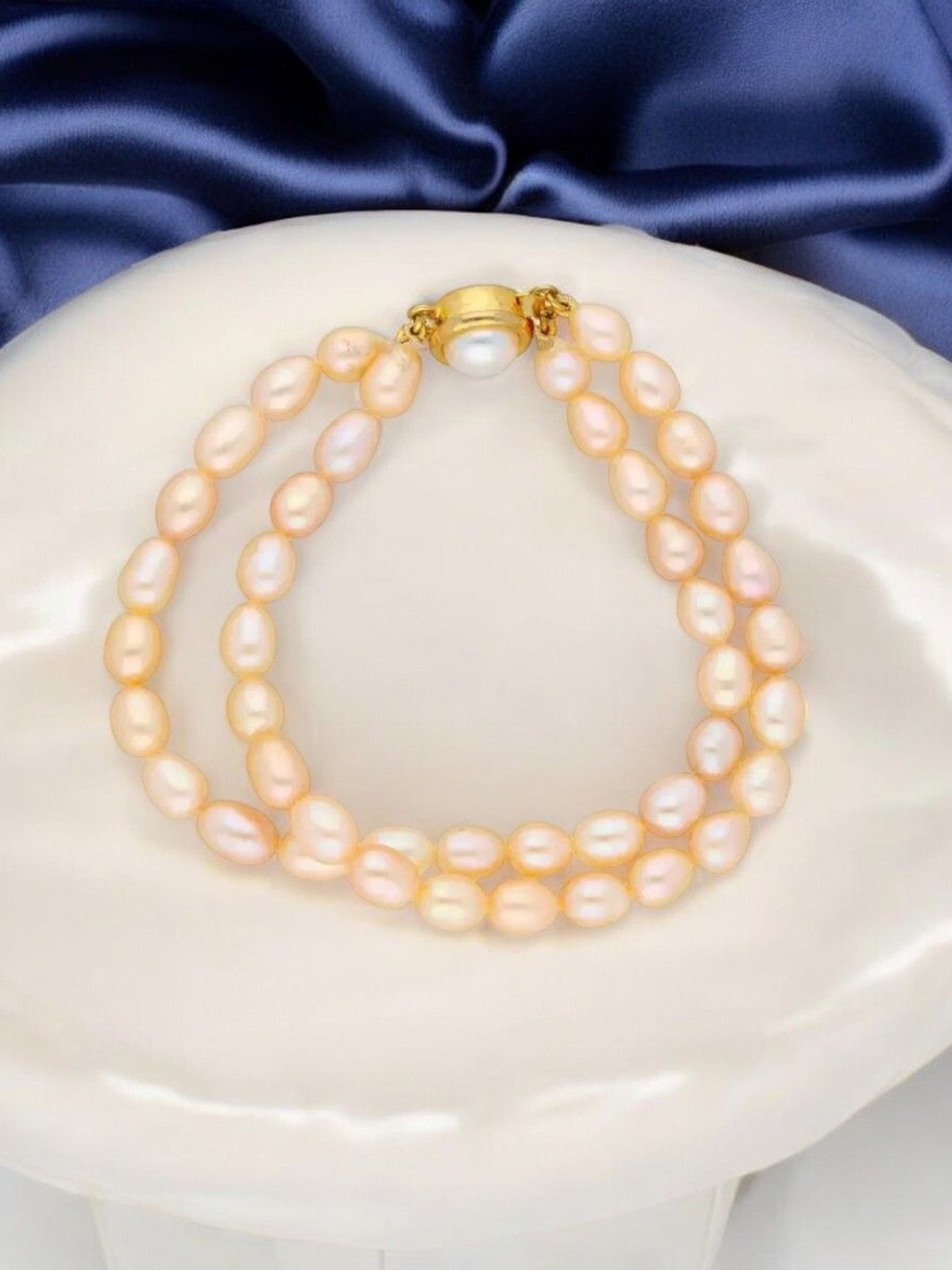 

Sri Jagdamba Pearls Dealer Gold-Plated Beaded Dual Line Bracelet