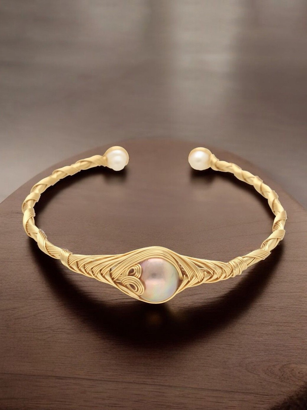 

Sri Jagdamba Pearls Dealer Gold Plated & Beaded Bracelet