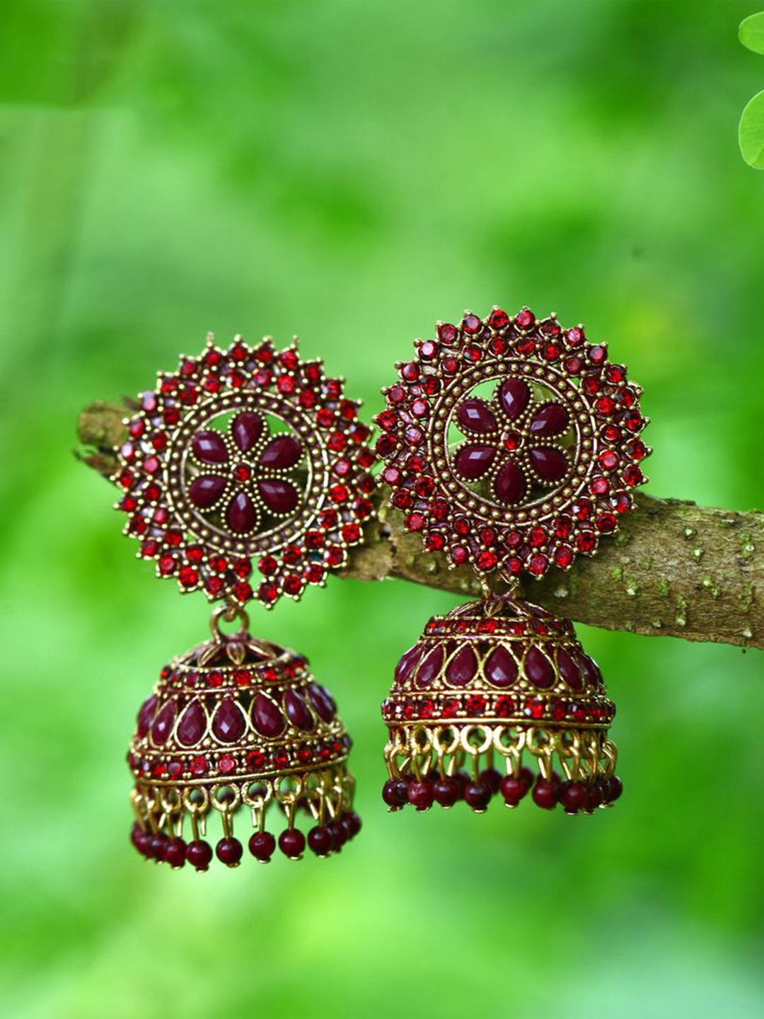 

DIVASTRI Gold-Plated Stone Studded & Beaded Dome Shaped Jhumkas, Maroon