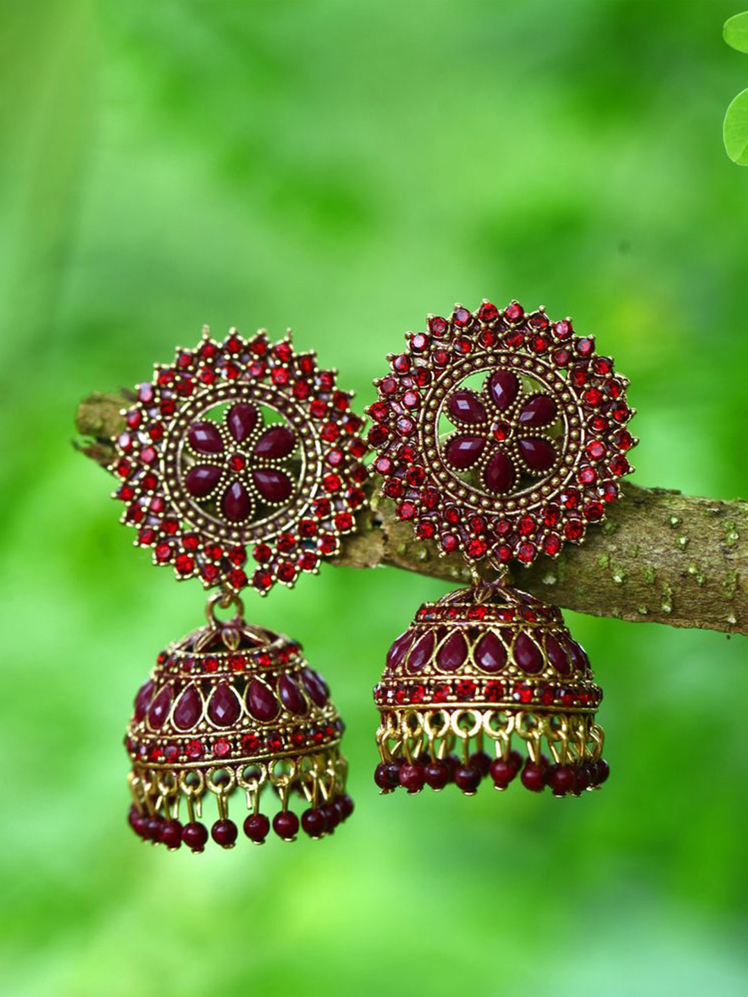 

DIVASTRI Gold-Plated Stone Studded & Beaded Dome Shaped Jhumkas, Maroon