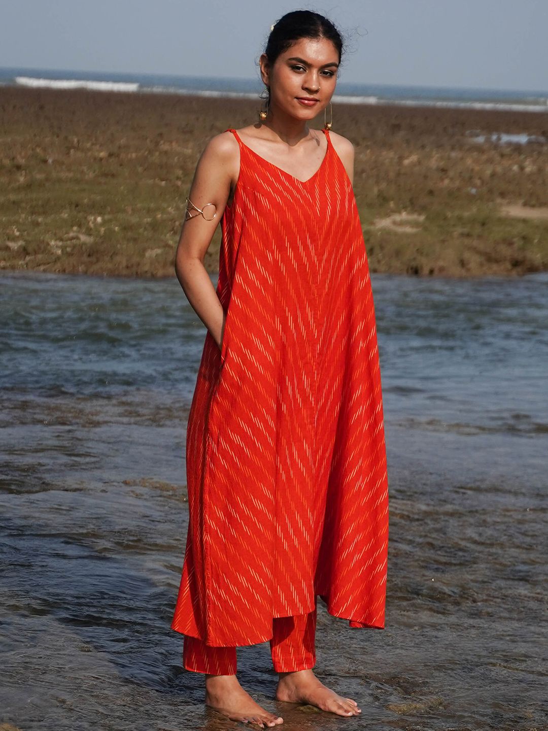 

OKHAI Women Regular Pure Cotton Kurta with Trousers, Orange
