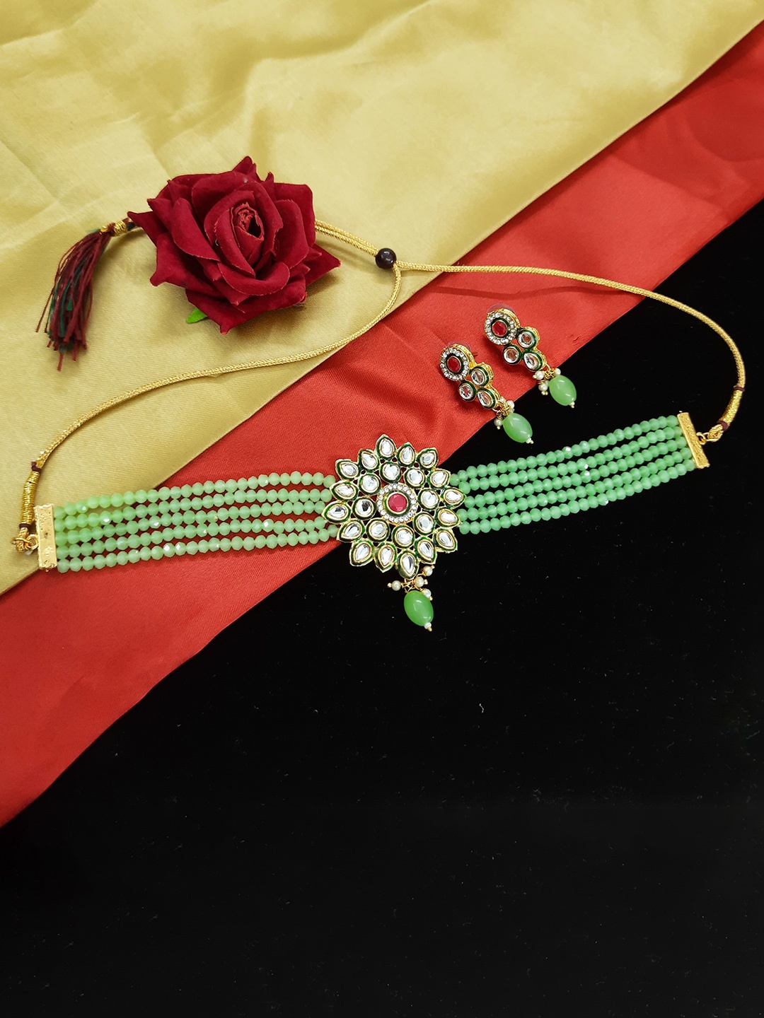

Knigght Angel Jewels Gold-Plated Stone Studded & Beaded Jewellery Set