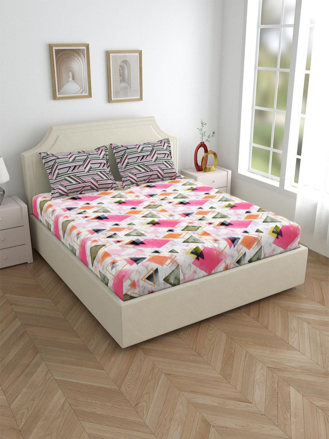 

Myntra Elegant Homes White & Pink Geometric 180 TC King Bedsheet with 2 Pillow Covers