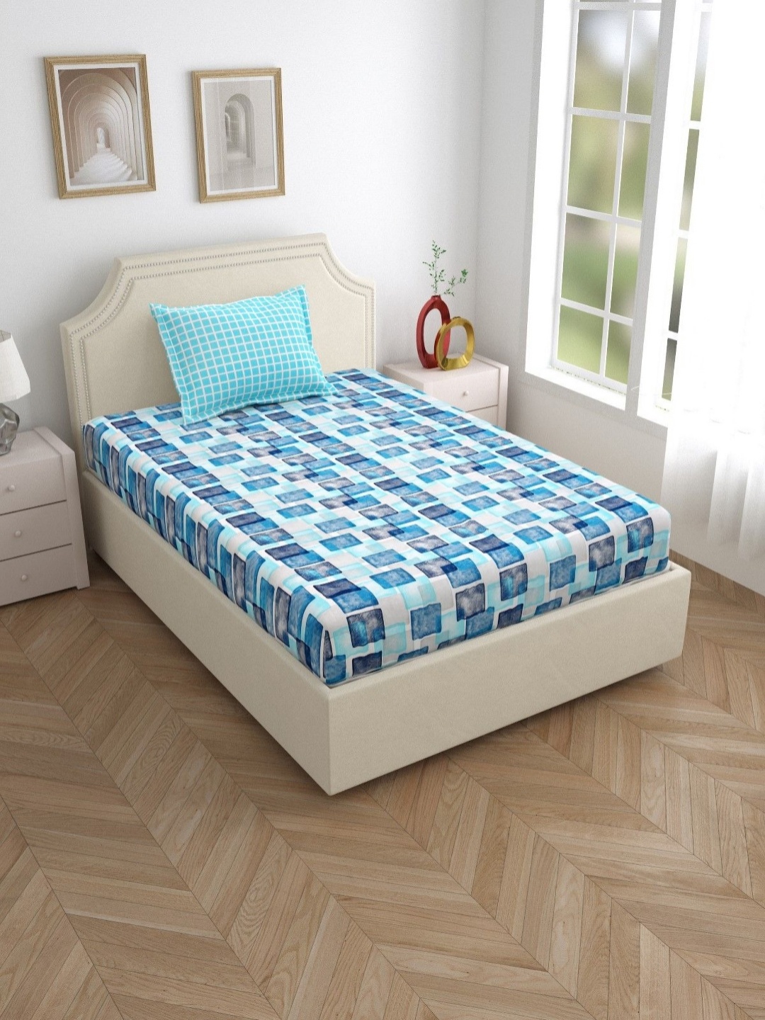 

Myntra Elegant Homes Blue & White Geometric 180 TC Single Bedsheet with 1 Pillow Covers