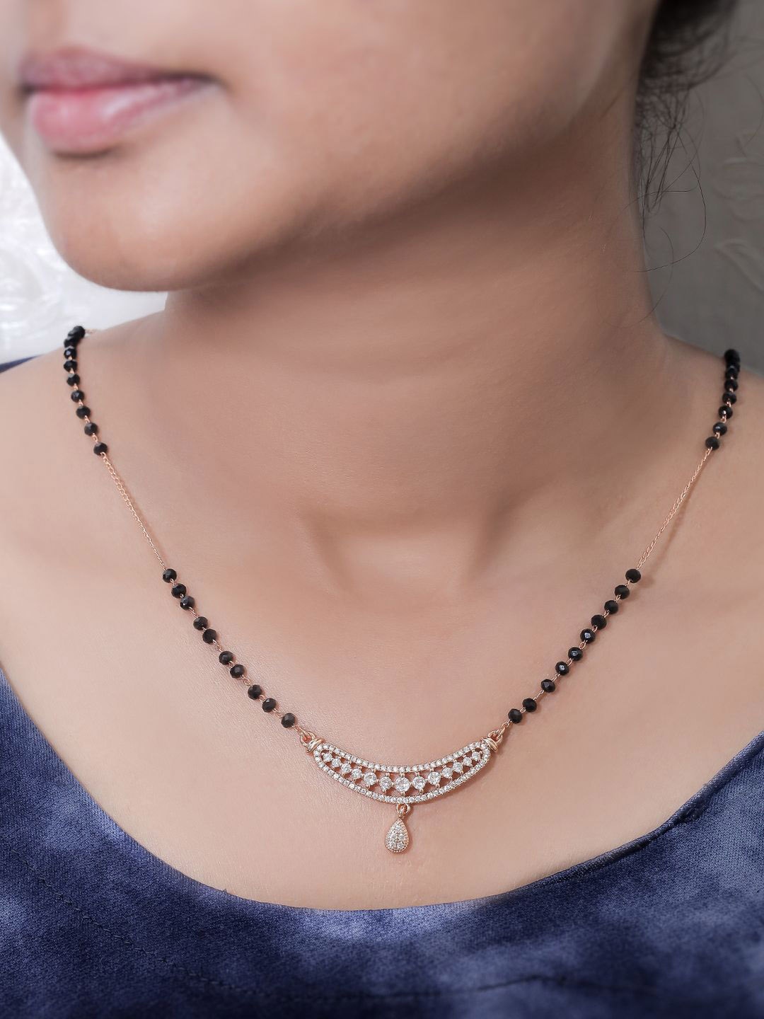 

SOLIBELLE Rose Gold-Plated Artificial Stones Studded & Beaded Mangalsutra