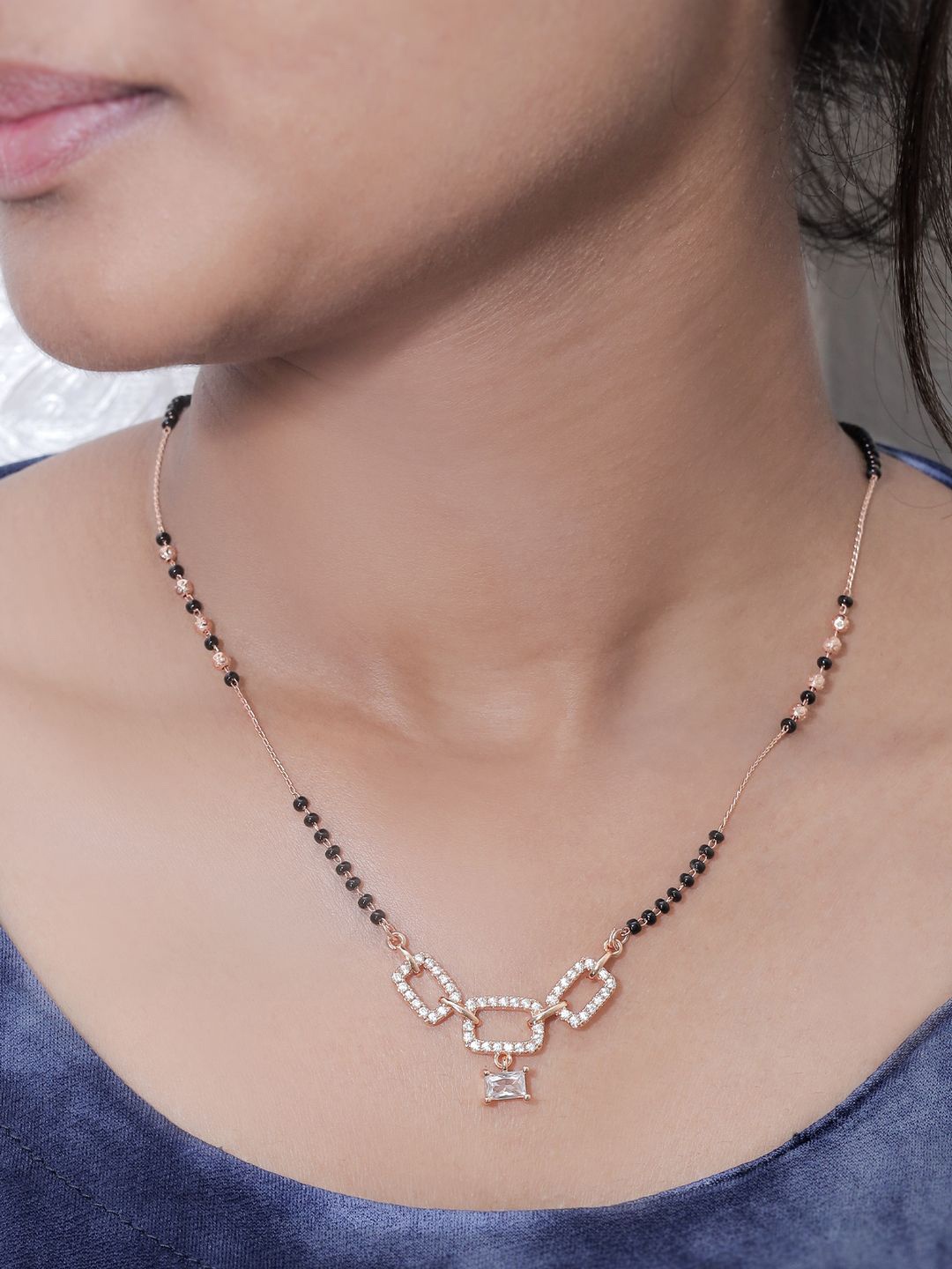 

SOLIBELLE Rose Gold-Plated Artificial Stones Studded & Beaded Mangalsutra