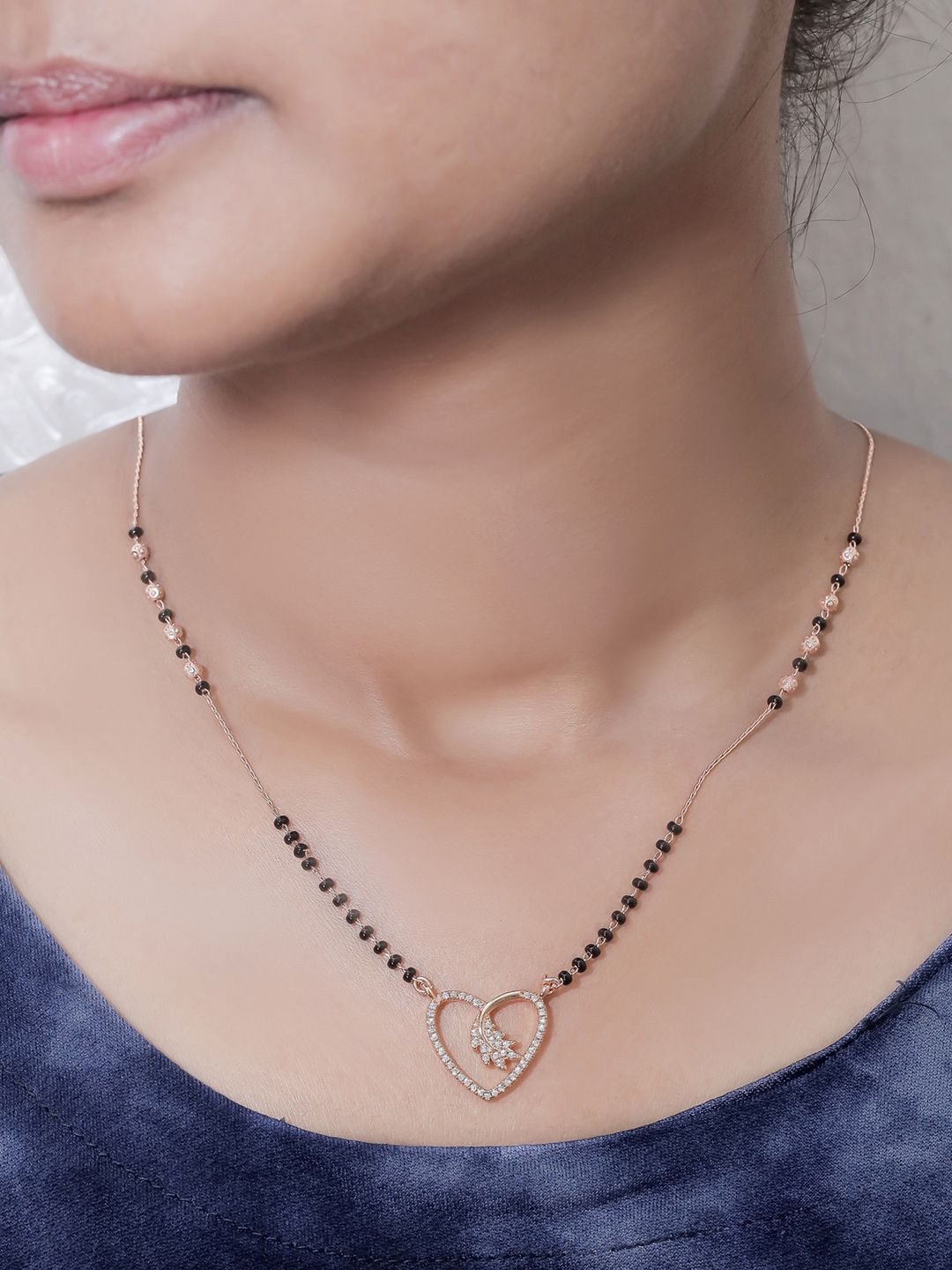 

SOLIBELLE Rose Gold-Plated Artificial Stones Studded Mangalsutra