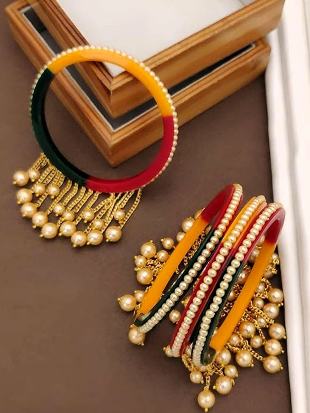 

Zindura Set Of 4 Gold Plated Crystals Studded & Pearls Beaded Bangles