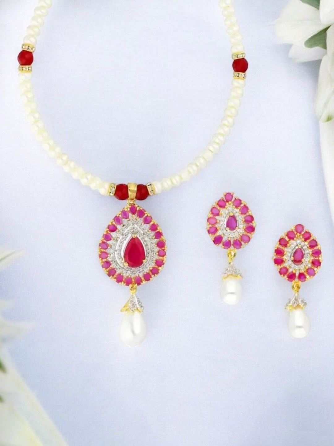 

Sri Jagdamba Pearls Dealer Gold-Plated Pearls Studded & Beaded Jewellery Set