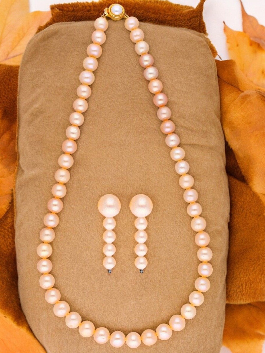 

Sri Jagdamba Pearls Dealer Gold-Plated Pearl-Studded Jewellery Set