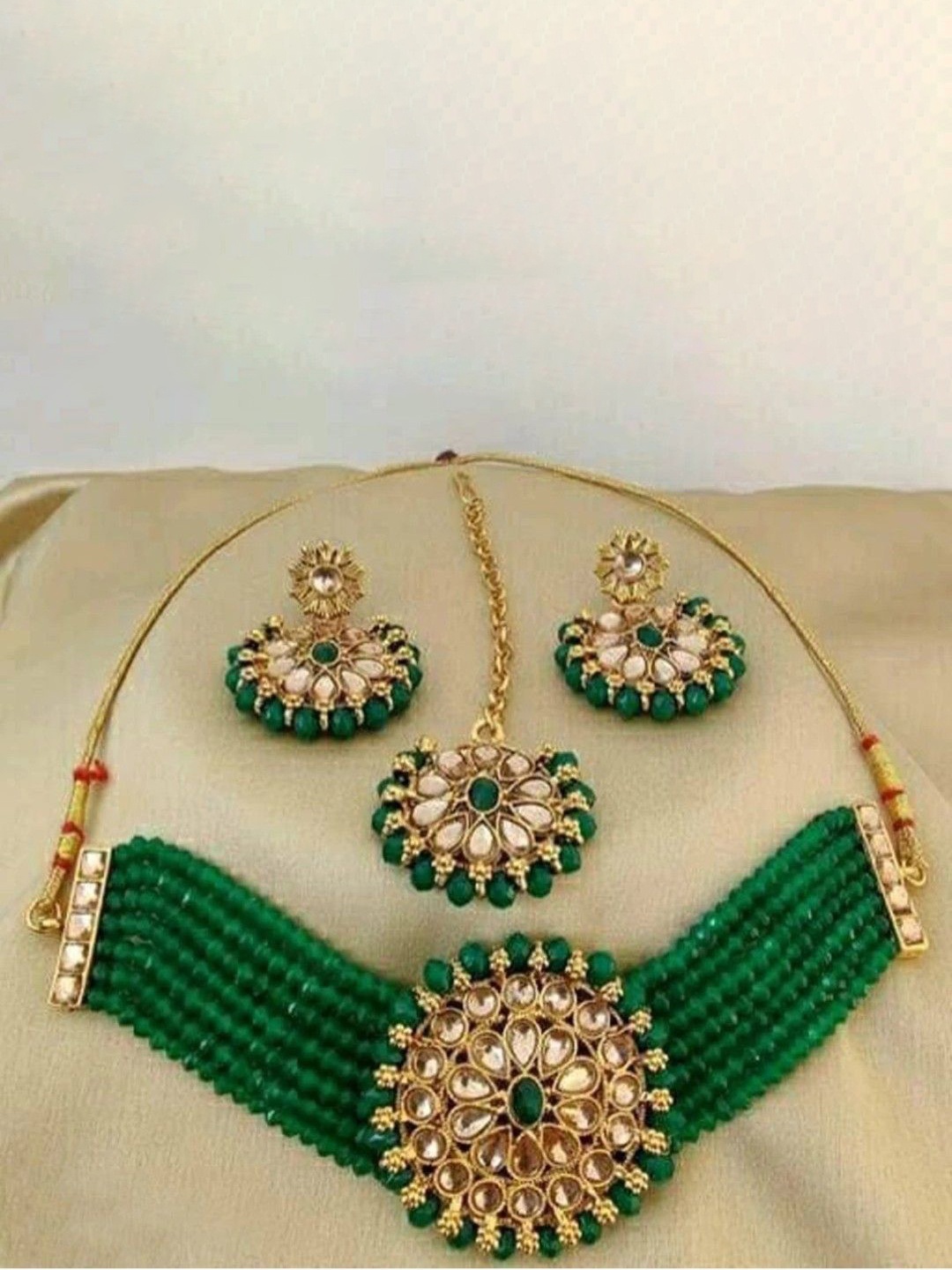 

JMBW INTERNATIONAL Gold-Plated & Green Kundan Studded Necklace & Earrings With Maang Tika