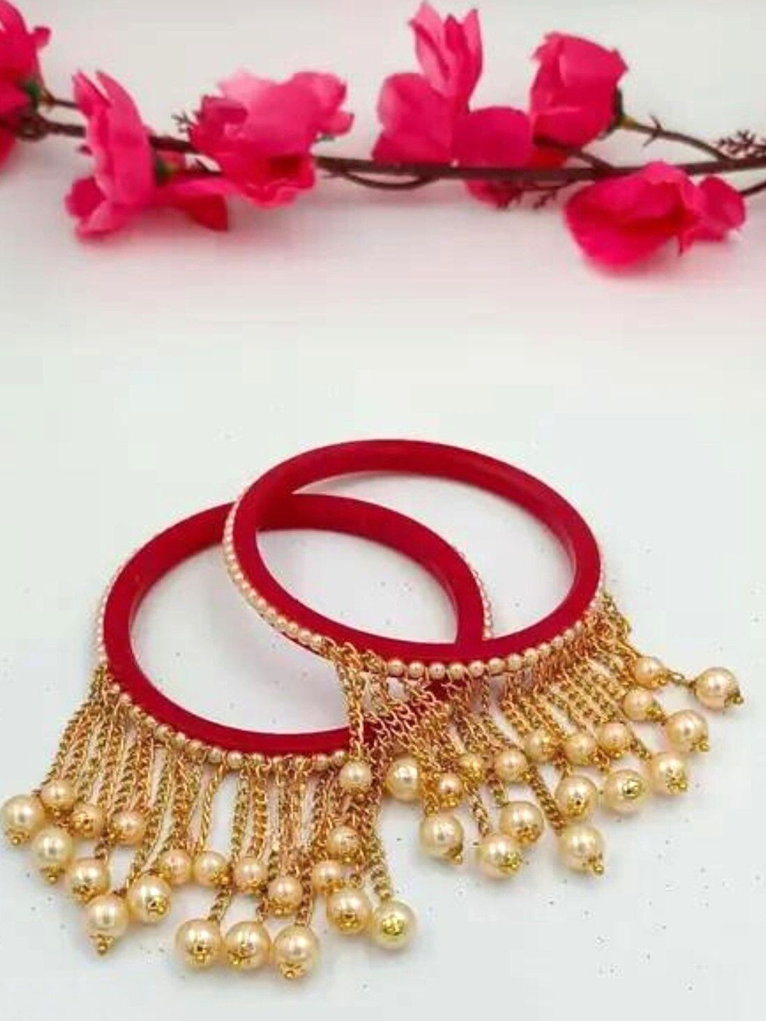 

Zindura Set Of 4 Gold Plated Crystal Studded & Pearls Beaded Bangles