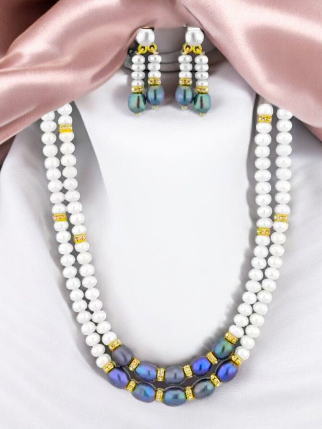

Sri Jagdamba Pearls Dealer Gold-Plated Stone-Studded & Beaded Jewellery Set