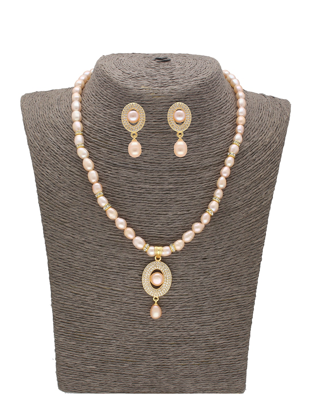 

Sri Jagdamba Pearls Dealer Gold Plated Stone Studded & Pearls Beaded Jewellery Set