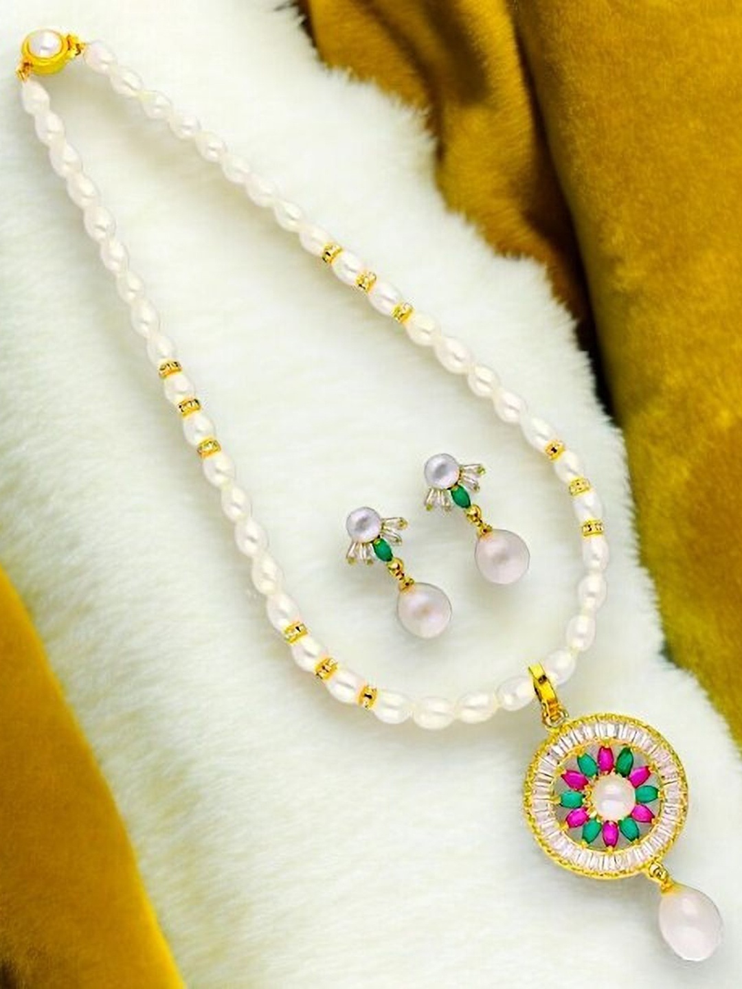 

Sri Jagdamba Pearls Dealer Gold-Plated Pearls Studded & Beaded Jewellery Set