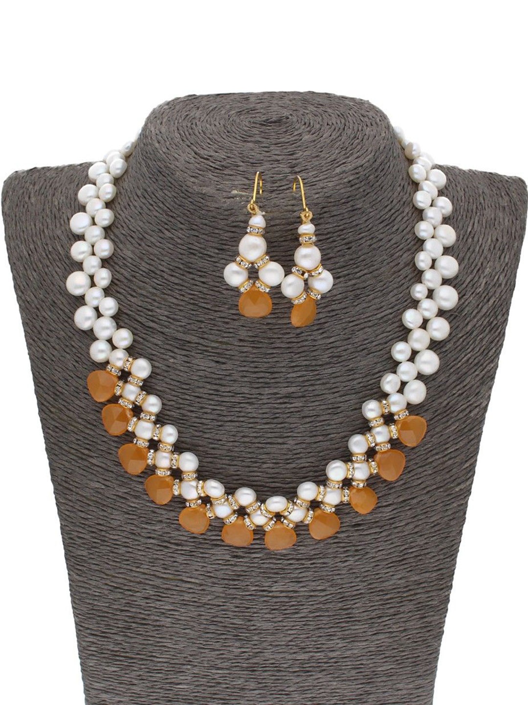

Sri Jagdamba Pearls Dealer Gold Plated Artificial Stones Studded & Beaded Jewellery Set
