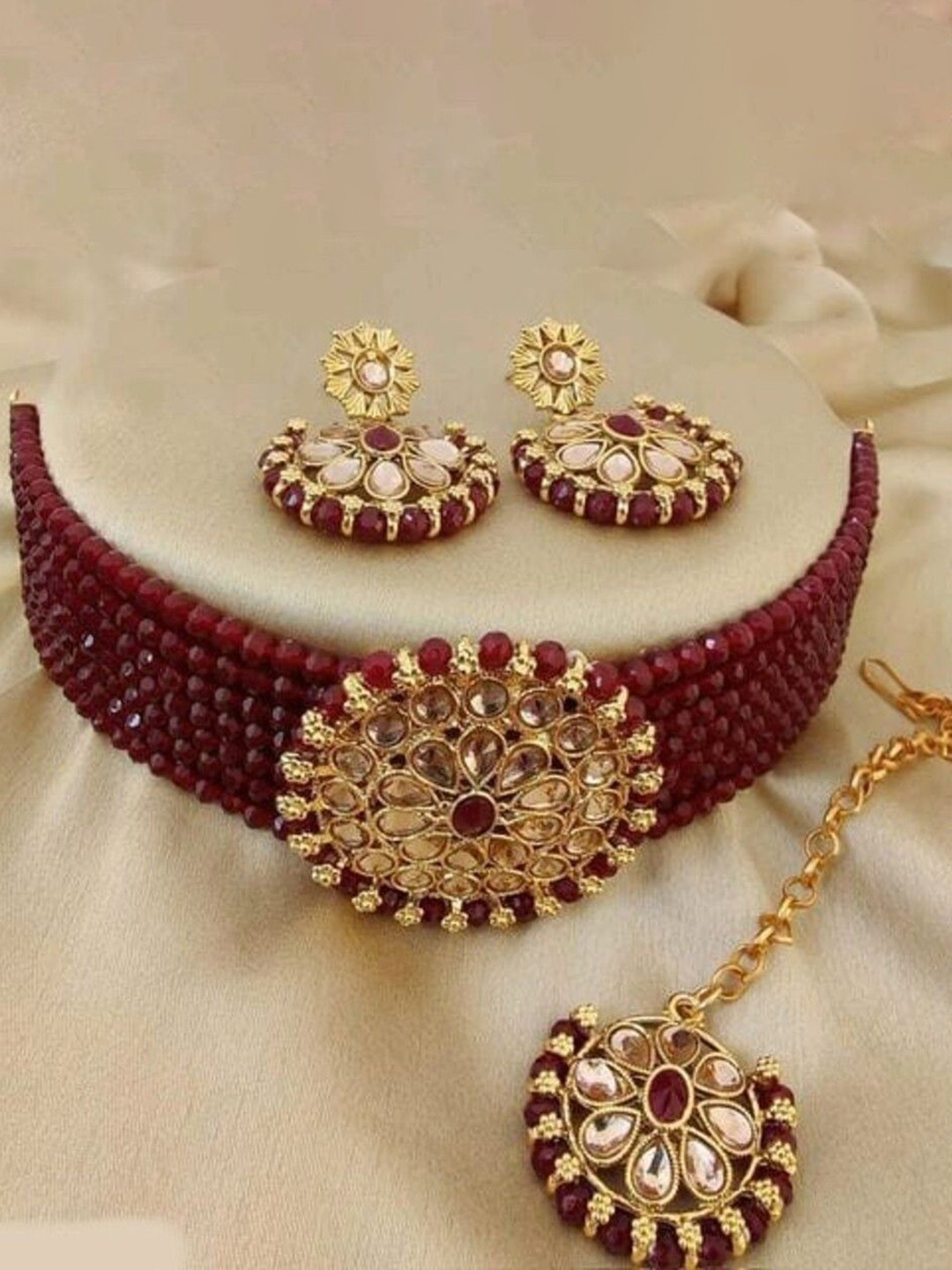 

JMBW INTERNATIONAL Gold Plated Crystals Studded Jewellery Set