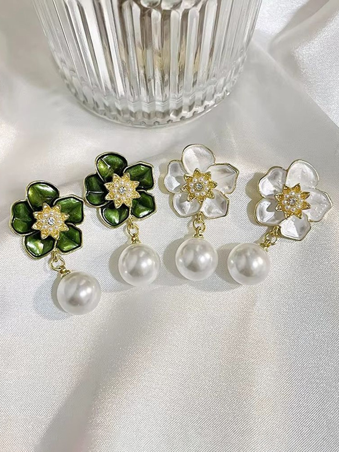 

Palli Creation Pack of 4 Gold Plated Pearls Studded Floral Shaped Drop Earrings