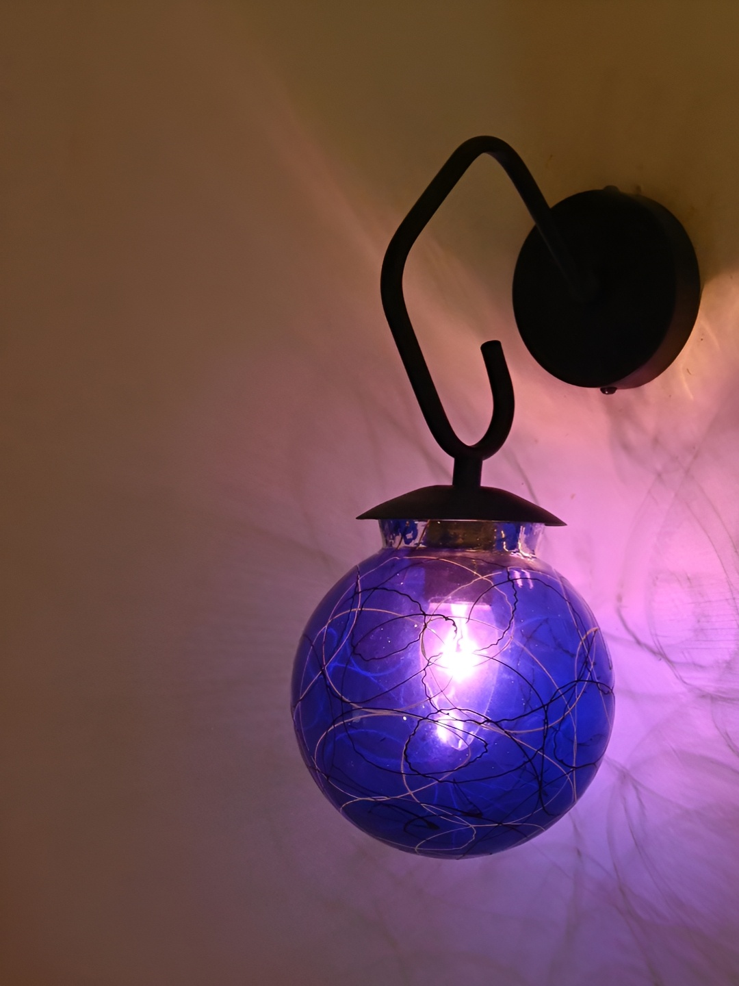 

Afast Blue & Black Printed Metal Spherical Shaped Wall Lamp