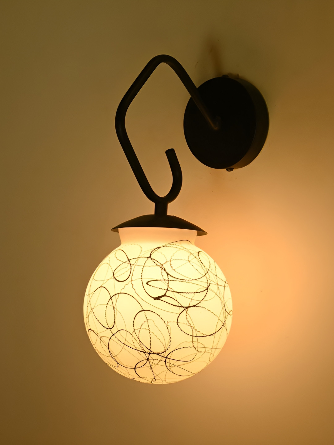 

Afast Black & White Printed Metal Spherical Shaped Wall Lamp