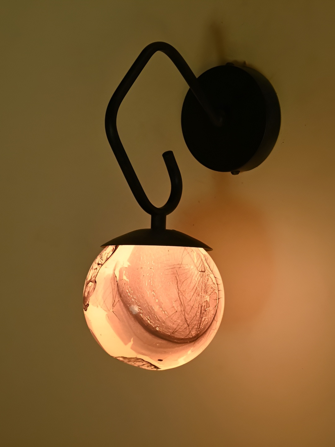 

Afast Black & White Printed Metal Spherical Shaped Wall Lamp