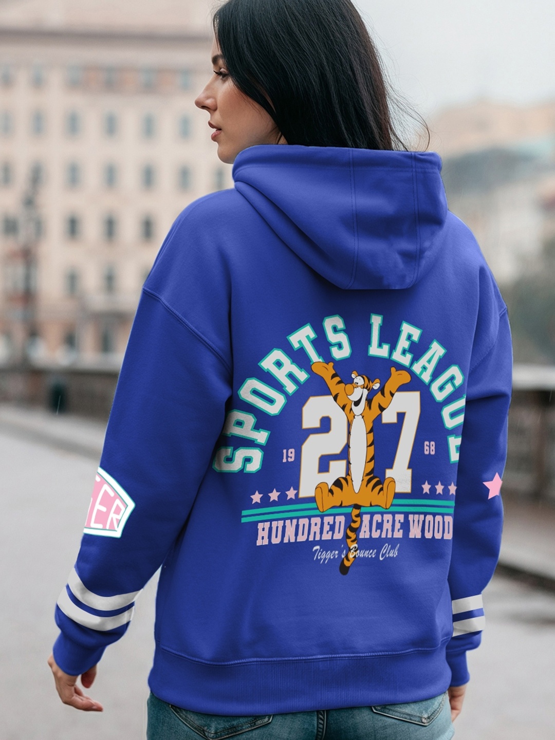 

Bewakoof Women Lolite Sports League Graphic Printed Oversized Hoodies Sweatshirt, Blue