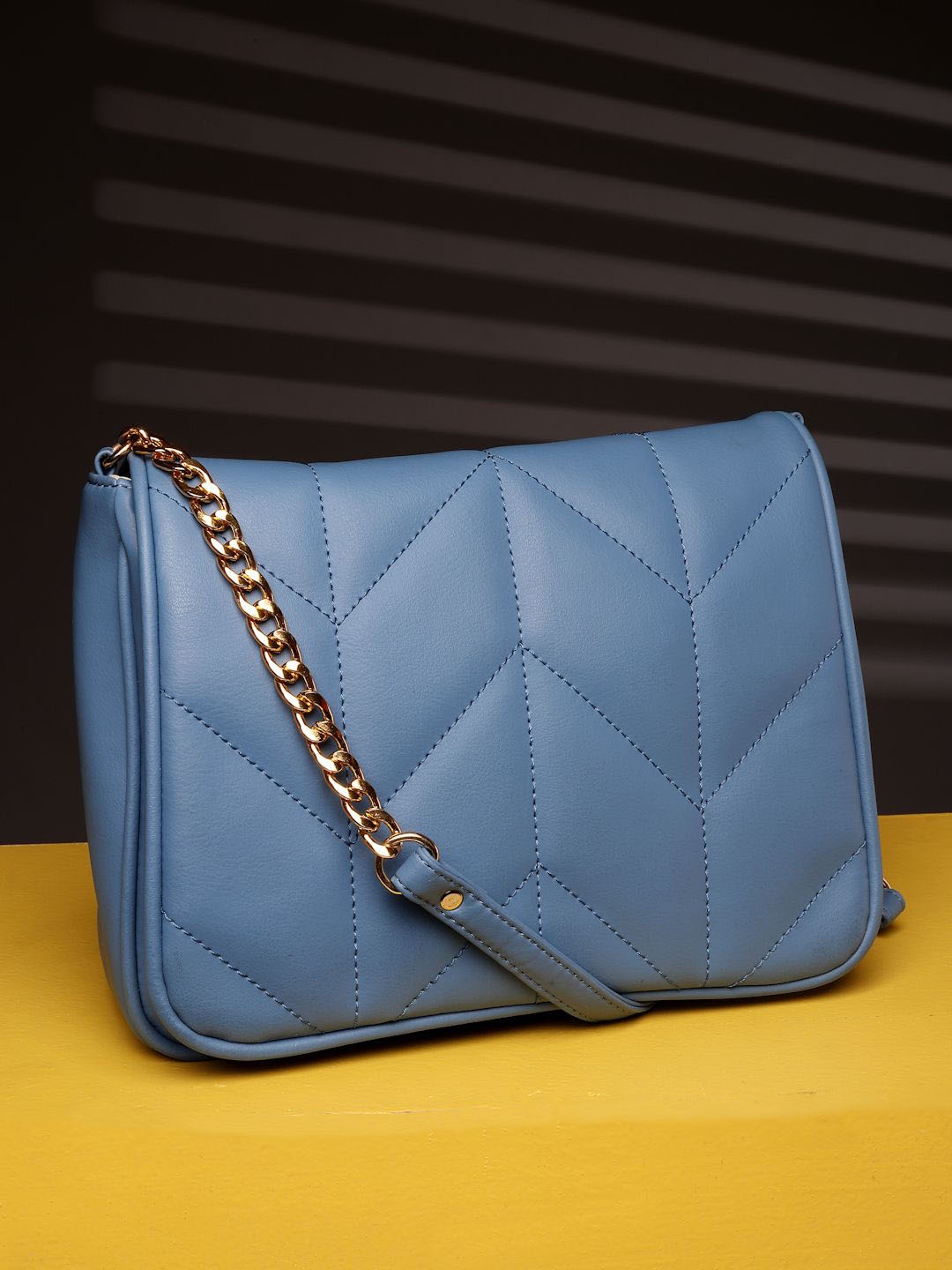 

DressBerry Women Solid Structured Sling Bag, Blue