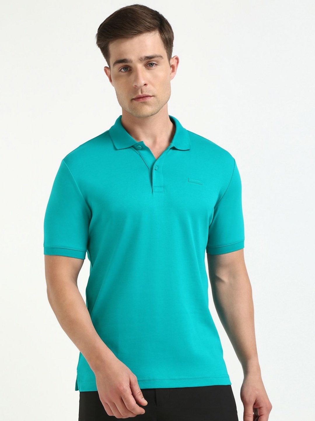 

Calvin Klein Jeans Men Solid Polo Collar Cotton T-shirt, Sea green