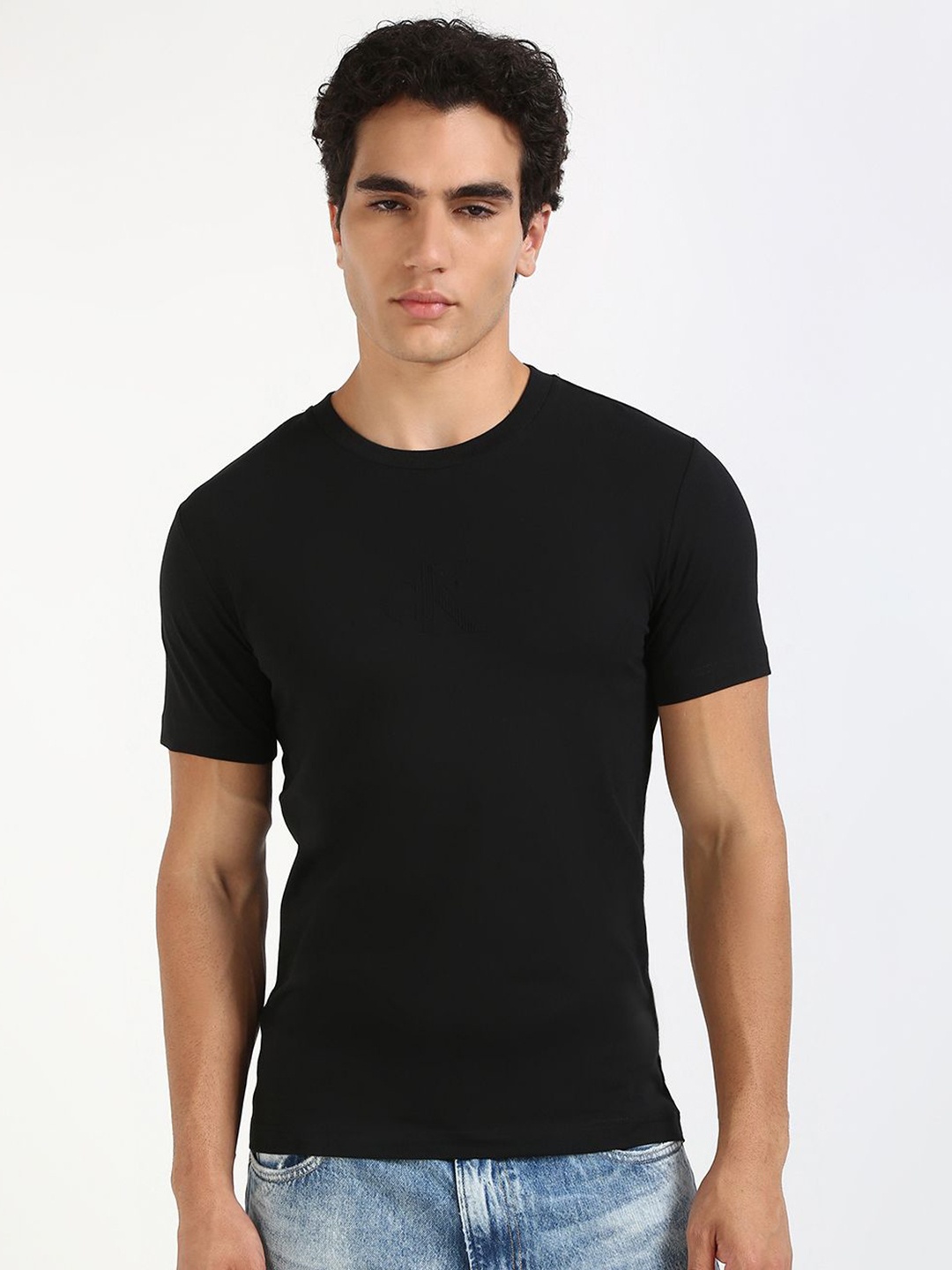 

Calvin Klein Jeans Men MONGRAM Solid Round Neck Cotton T-shirt, Black